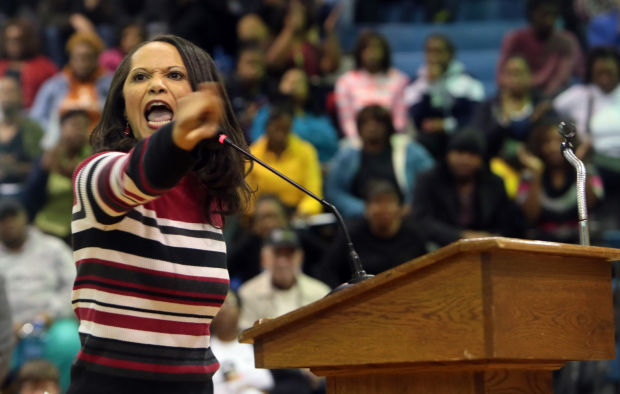 Parents protest the suspension of Superintendent Art McCoy