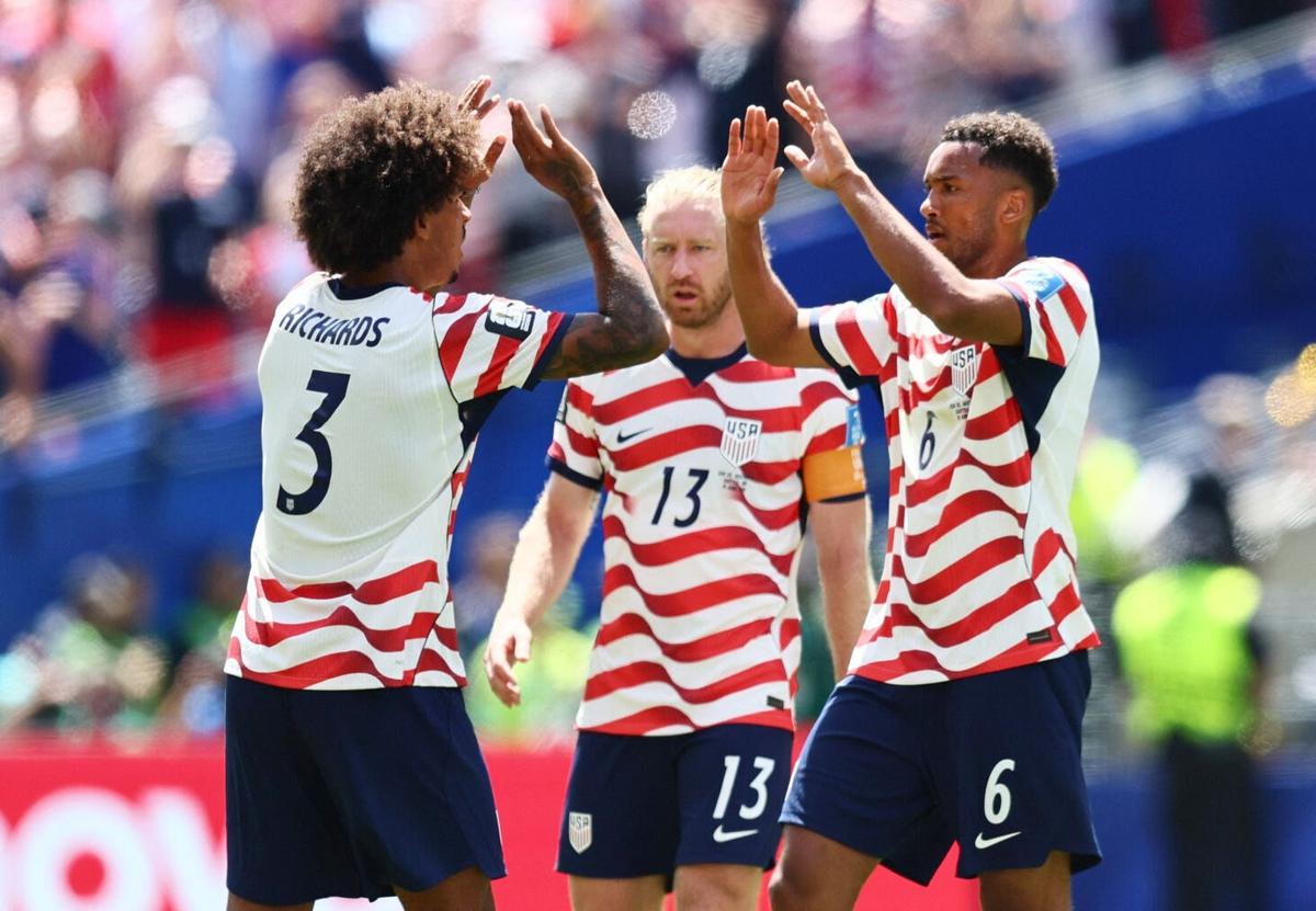 June 19, 2026; Seattle, Washington, U.S.; Chris Richards, Auston Trusty and Tim Ream of the U.S. celebrate after the match. Mandatory Credit: Blake Dahlin-Imagn Images