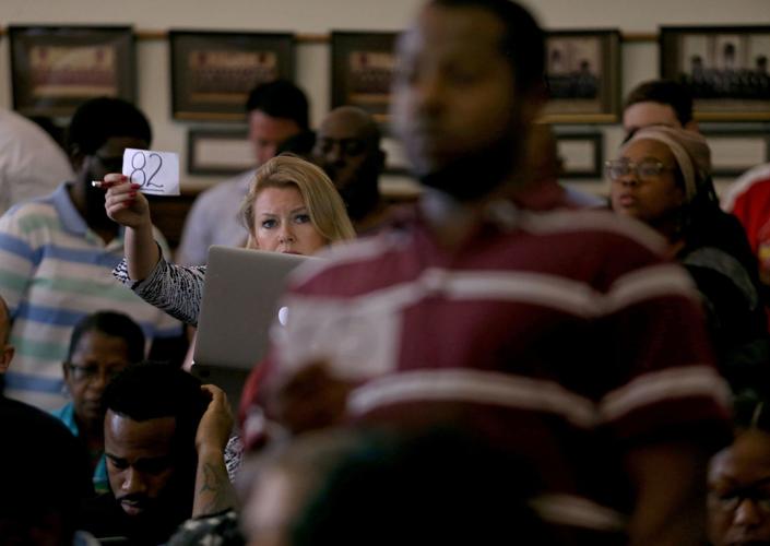 City auctions several hundred properties