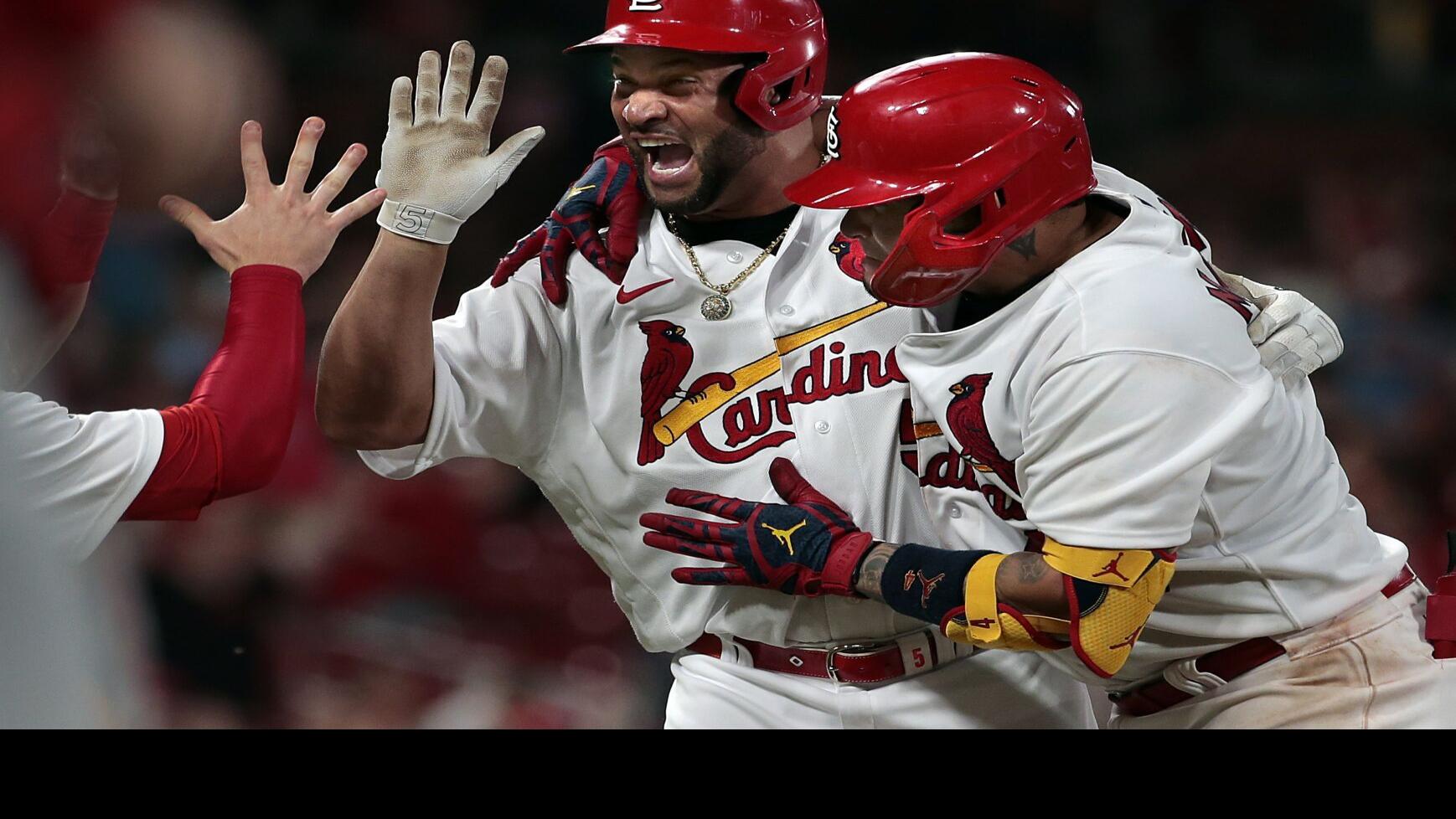 Pujols rescues Cardinals in 10th for 3-2 win as Goldschmidt, Wainwright shine