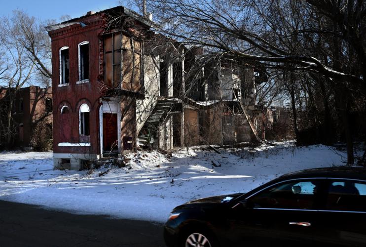 An entire wall is missing, but the building still stands