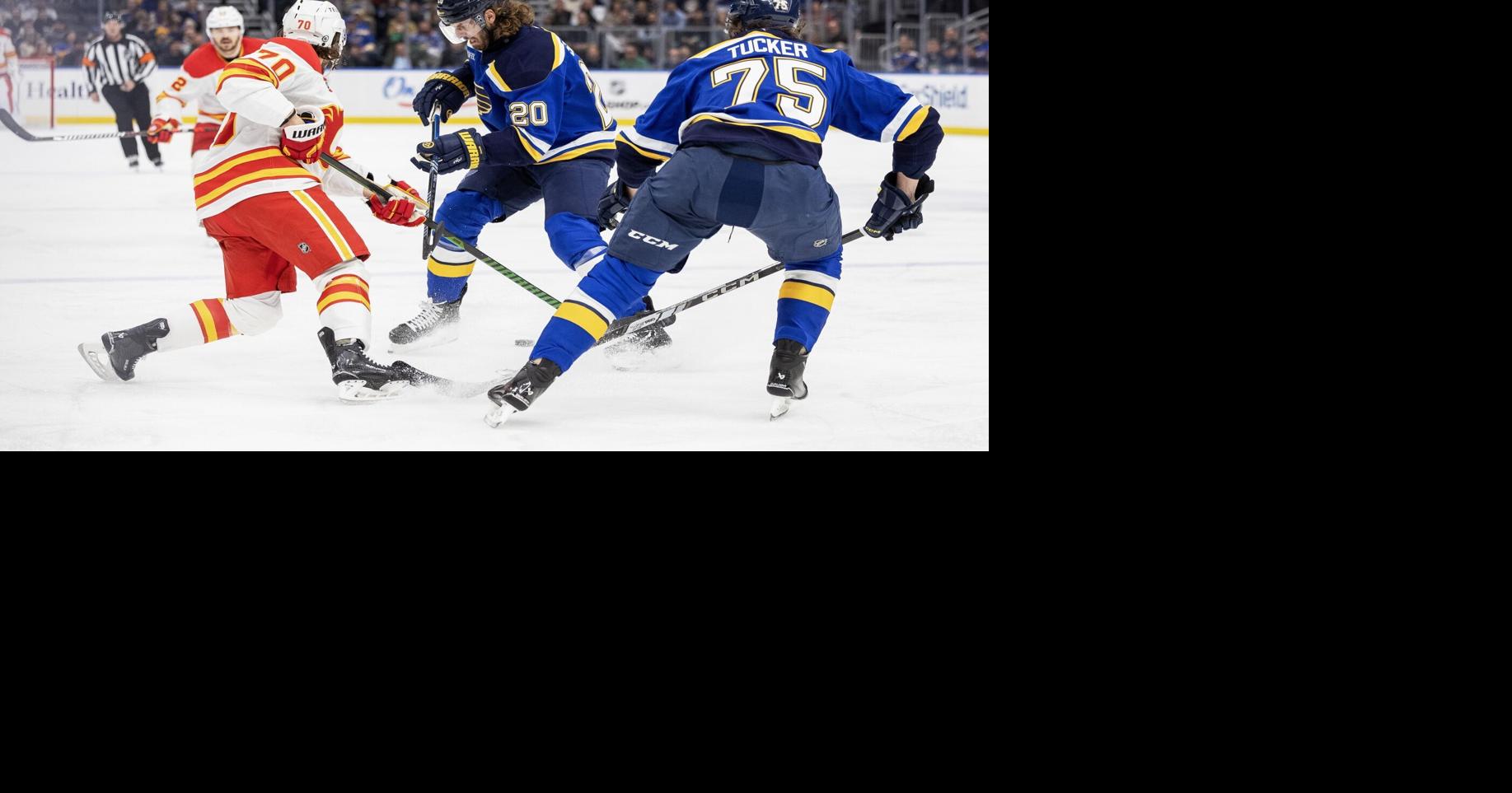 Blues Battle Flames in Crucial Playoff Showdown