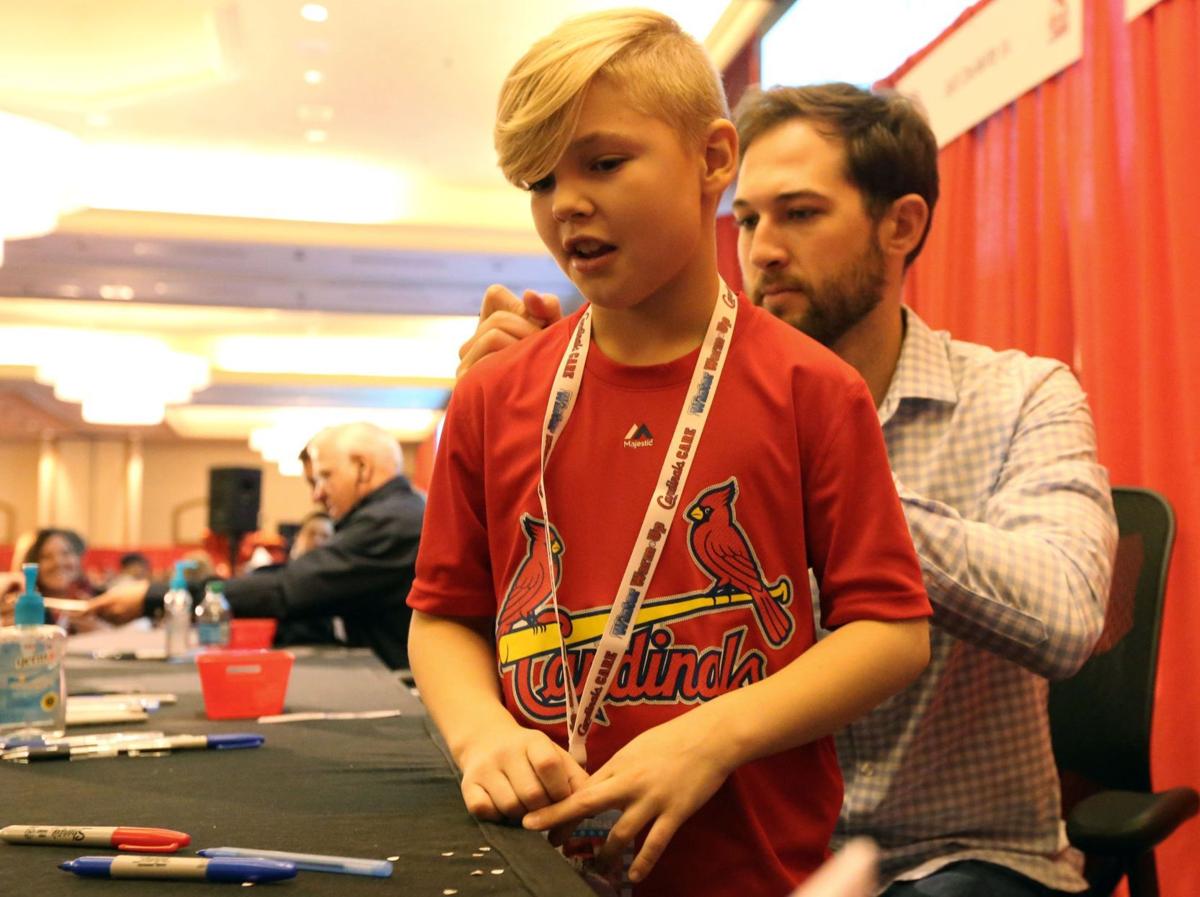Michael Wacha signs a T-shirt at Cardinals Winter Warm-Up