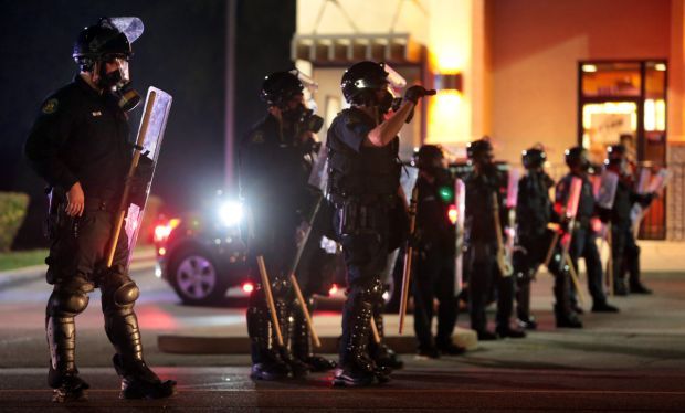 Riot breaks out, store burned