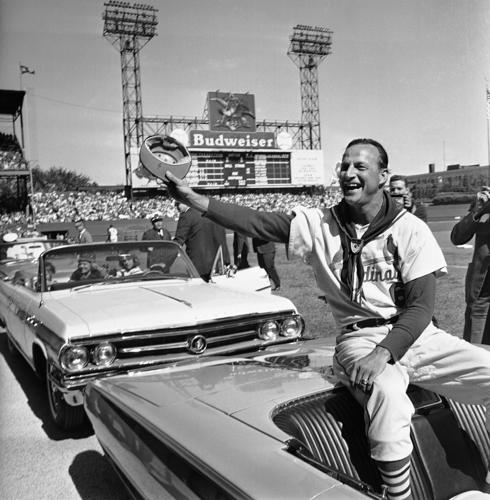 Fans welcome home Cardinals, remember Musial