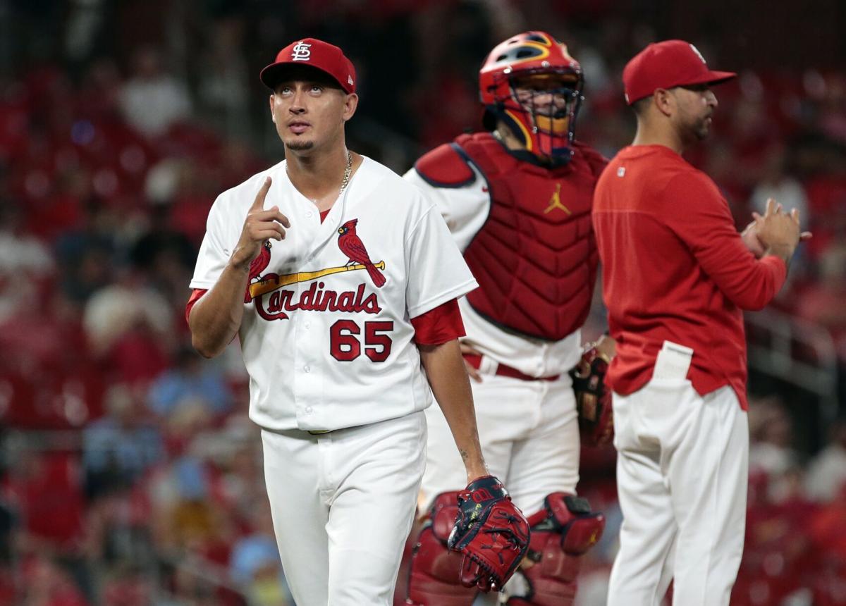 St. Louis, United States. 16th July, 2022. St. Louis Cardinals Brendan  Donovan inspects his arm after being hit by a pitch in the second inning  against the Cincinnati Reds at Busch Stadium