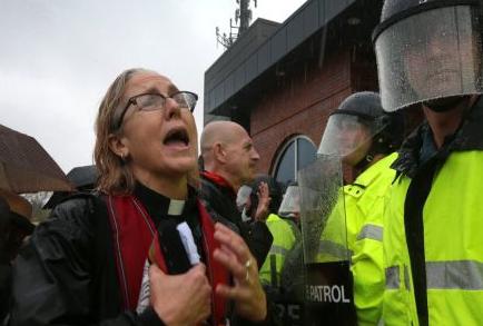 Clergy demonstrates at Ferguson Police Department