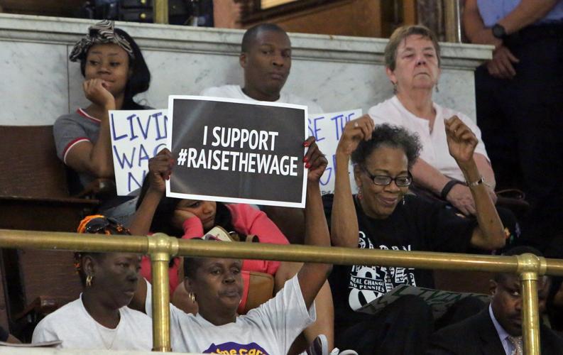 Minimum wage hike bill passes first round at City Hall