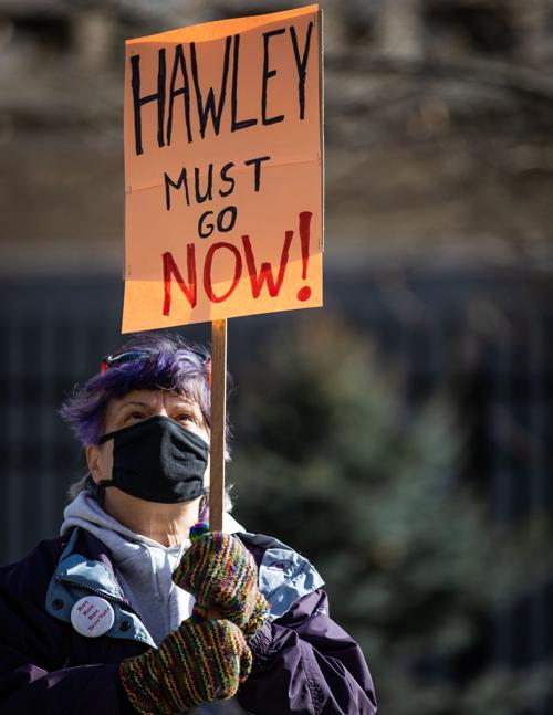 Demonstrators demand Hawley's resignation at downtown protest