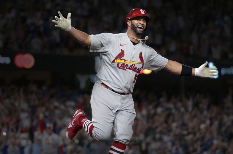 Pujols hits 700