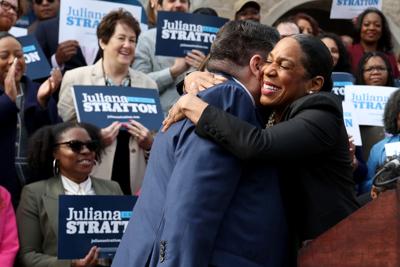 Lt. Gov. Juliana Stratton embraces Gov. JB Pritzker
