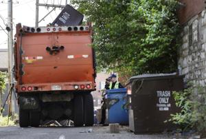 St, Louis trash truck backs over, kills woman