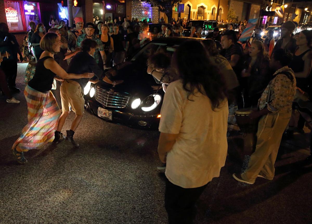 Car Drives Through People Blocking The Road Car Drives Through People Blocking The Road