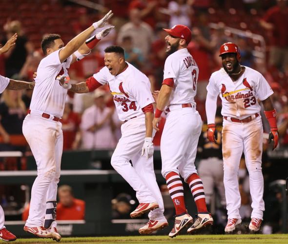 How crazy is that?! Down 8-5 in ninth, Cardinals score five and win on  walk-off blast by Munoz