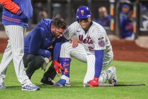 Designated hitter Juan Soto reacts after fouling a ball off of his foot in the New York Mets' May 13 game against the Detroit Tigers at Citi Field. The 27-year-old has a contract running through the 2039 season, the longest active deal in Major Leagu