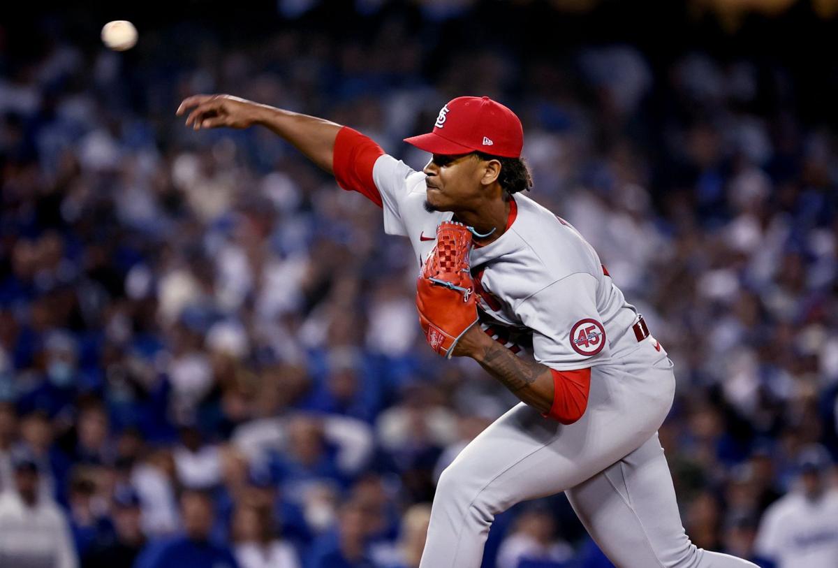 Cards reliever, rookie manager get heated on mound in win