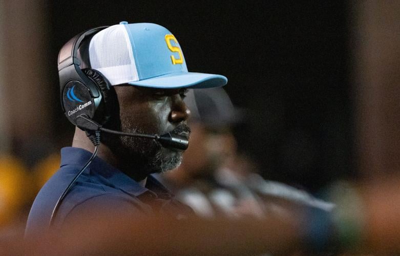 Southern head coach Marshall Faulk watches on the sidelines during the game against Jackson State at Veterans Memorial Stadium