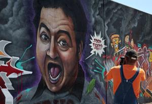 Paint St. Louis puts new art on an old downtown St. Louis wall