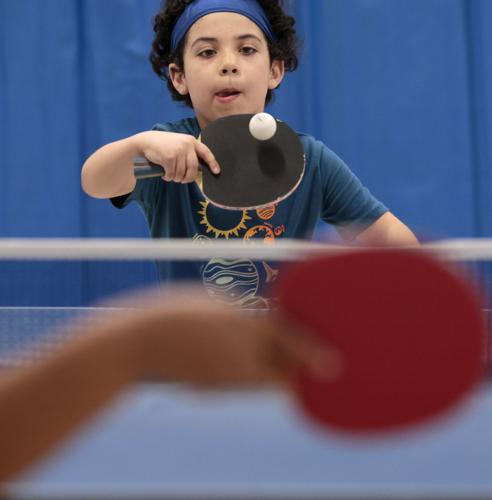 Table tennis enthusiasts meet and play hard