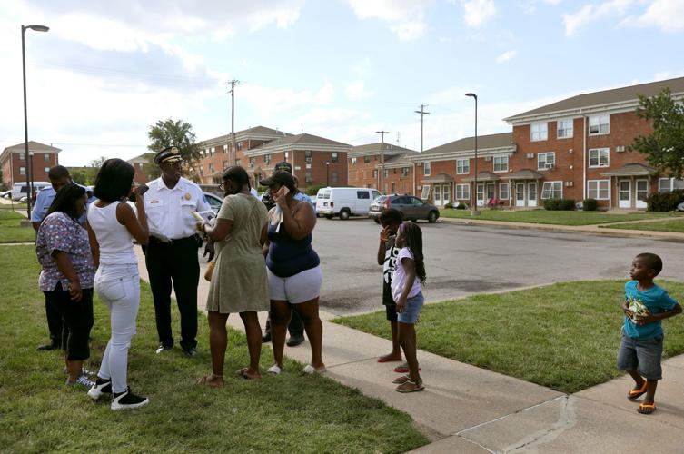 St. Louis police chief John Hayden walks Clinton-Peabody housing complex