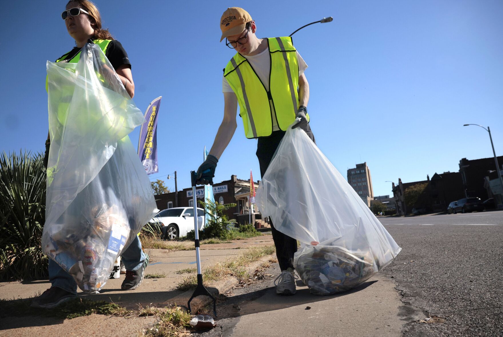 Cyclist advocacy group clears lanes and walkways along Gravois Avenue