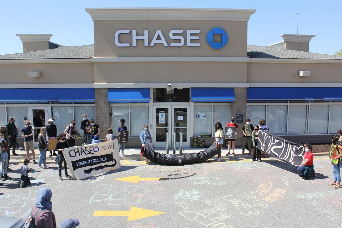 St. Louis activists stand outside of Chase Bank in Brentwood