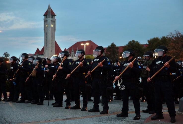Protesters spend day at police headquarters