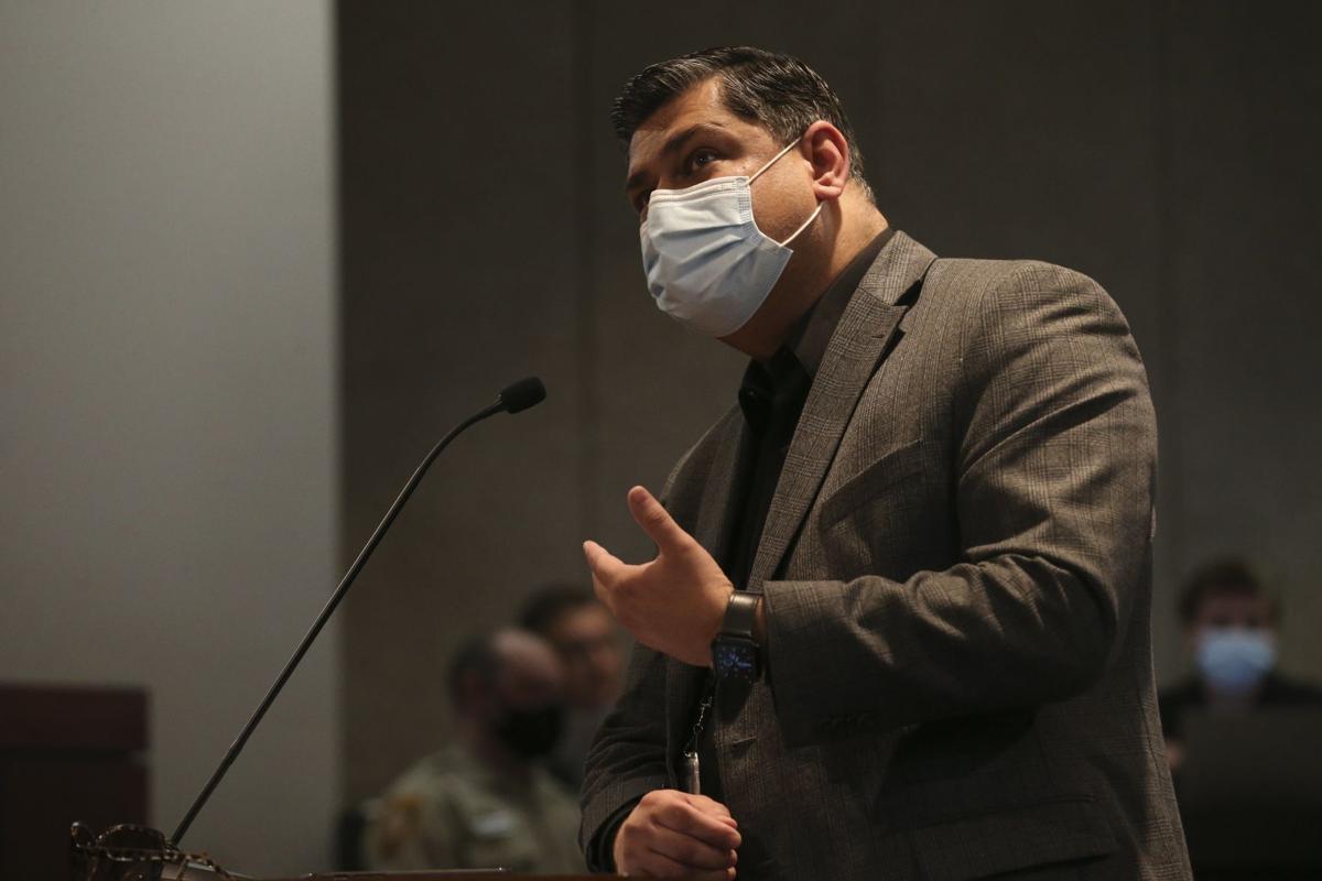 Dr. Faisal Khan, the director of the Department of Public Health, answers questions