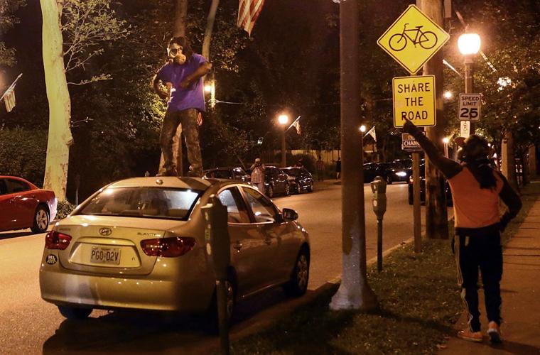 Protesters march on Central West End after vigil for Mansur Ball-Bey