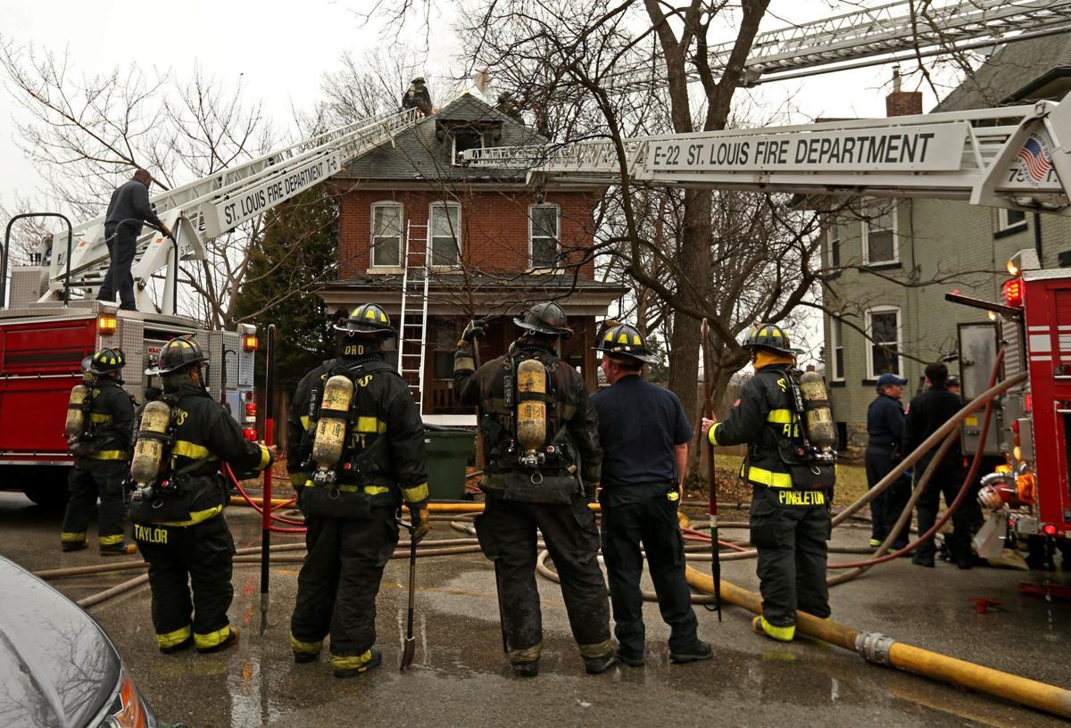 Firefighters battle house fire in St. louis near Dewey School Metro