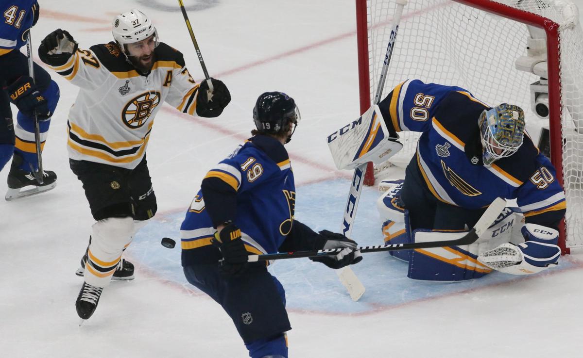 NHL playoffs 2019: Bruins defenseman Torey Krug helped off ice after hard  hit into boards
