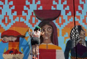 Paint St. Louis puts new art on an old downtown St. Louis wall