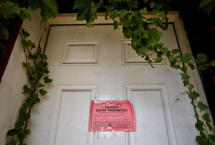 Vacant buildings in 51 tornado path hinder clean up