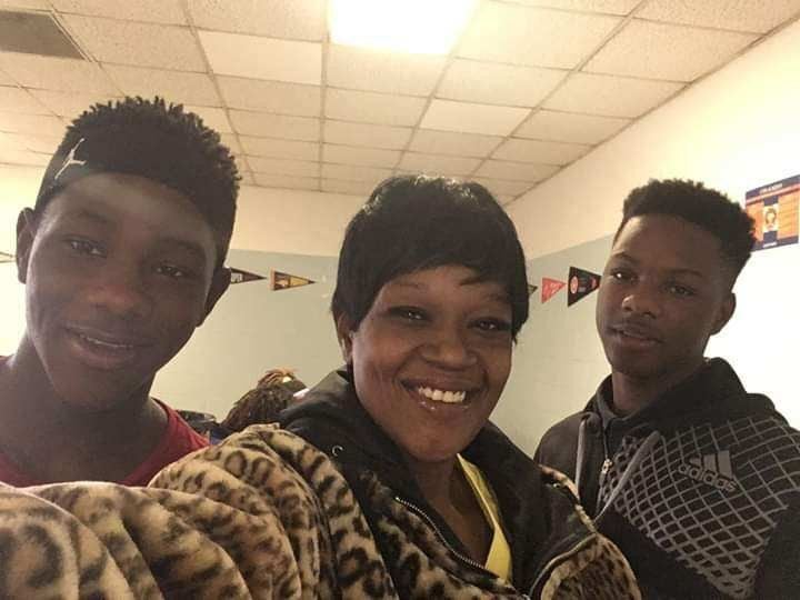 Sentonio Cox, 15, and his family