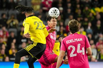 Columbus Crew defender Mohamed Farsi (23) heads a ball over �����Ӱ�ԭ�� CITY SC during the U.S. Open Cup soccer final at