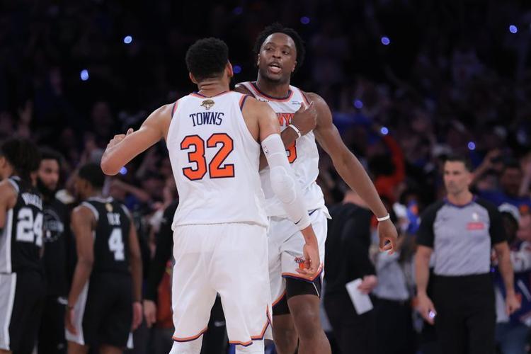 Jun 10, 2026; New York, New York, USA; New York Knicks forward Og Anunoby (8) and center Karl-Anthony Towns (32) react in the fourth quarter against the San Antonio Spurs during game four of the 2026 NBA Finals at Madison Square Garden. Mandatory Credit...