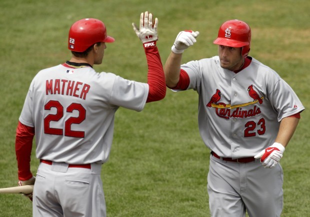 David Freese of the St. Louis Cardinals celebrates after hitting a