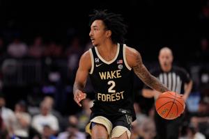 Mar 10, 2026; Charlotte, NC, USA; Wake Forest Demon Deacons forward Juke Harris (2) brings the ball up court against the Virginia Tech Hokies during the second half at Spectrum Center. Mandatory Credit: Jim Dedmon-Imagn Images