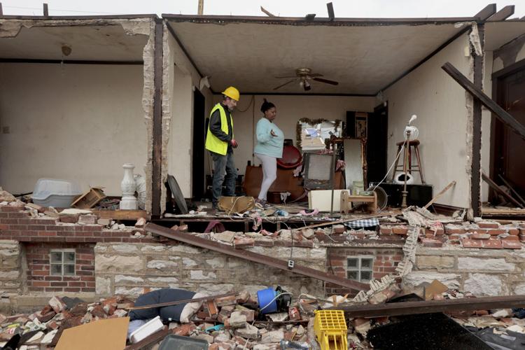 Residents continue to check on their homes in the Greater Ville