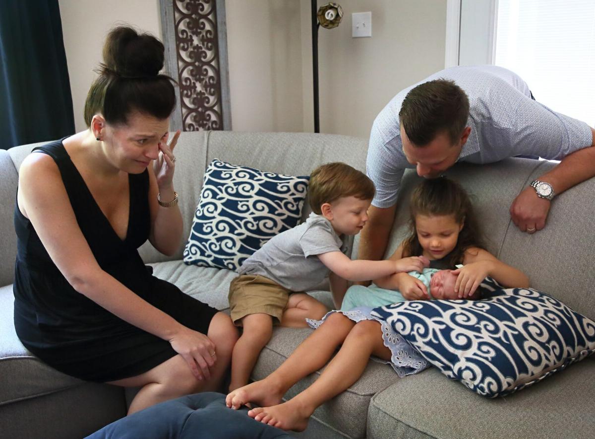 Baby goes home for first time after being delivered when mom was on ventilator because of COVID-19