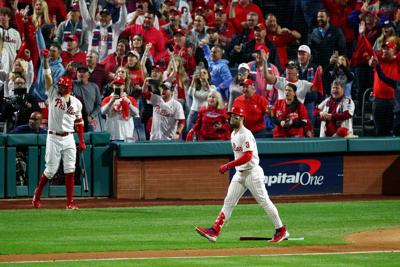 Bryce Harper of the Philadelphia Phillies hits a two-run home run against the Houston Astros during the first inning in Game 3 of the World Series at Citizens Bank Park on Tuesday, Nov. 1, 2022, in Philadelphia.