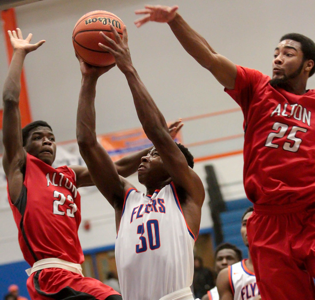 Redbirds rally in second half to knock off East St. Louis Boys