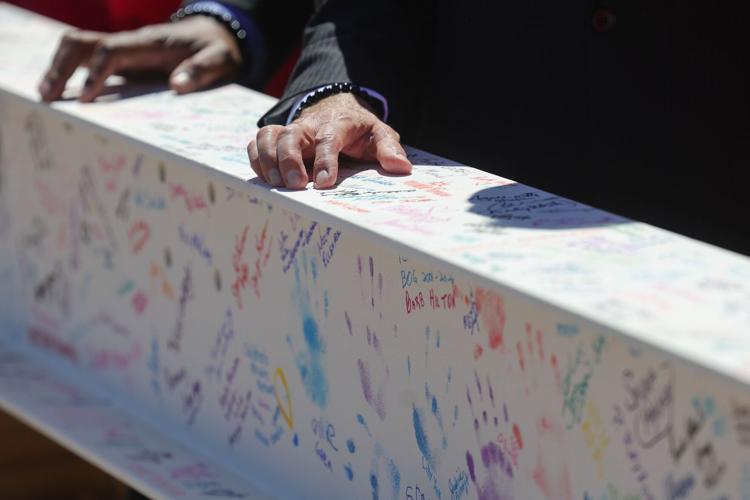 SMM Health holds a ‘topping off’ ceremony with signed beam on new pediatric 14-story hospital