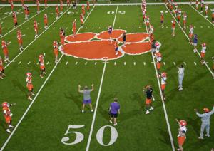 Clemson Tigers football stretch during practice in the at the Allen N. Reeves Sports Complex in Clemson, S.C. Friday, August 7,