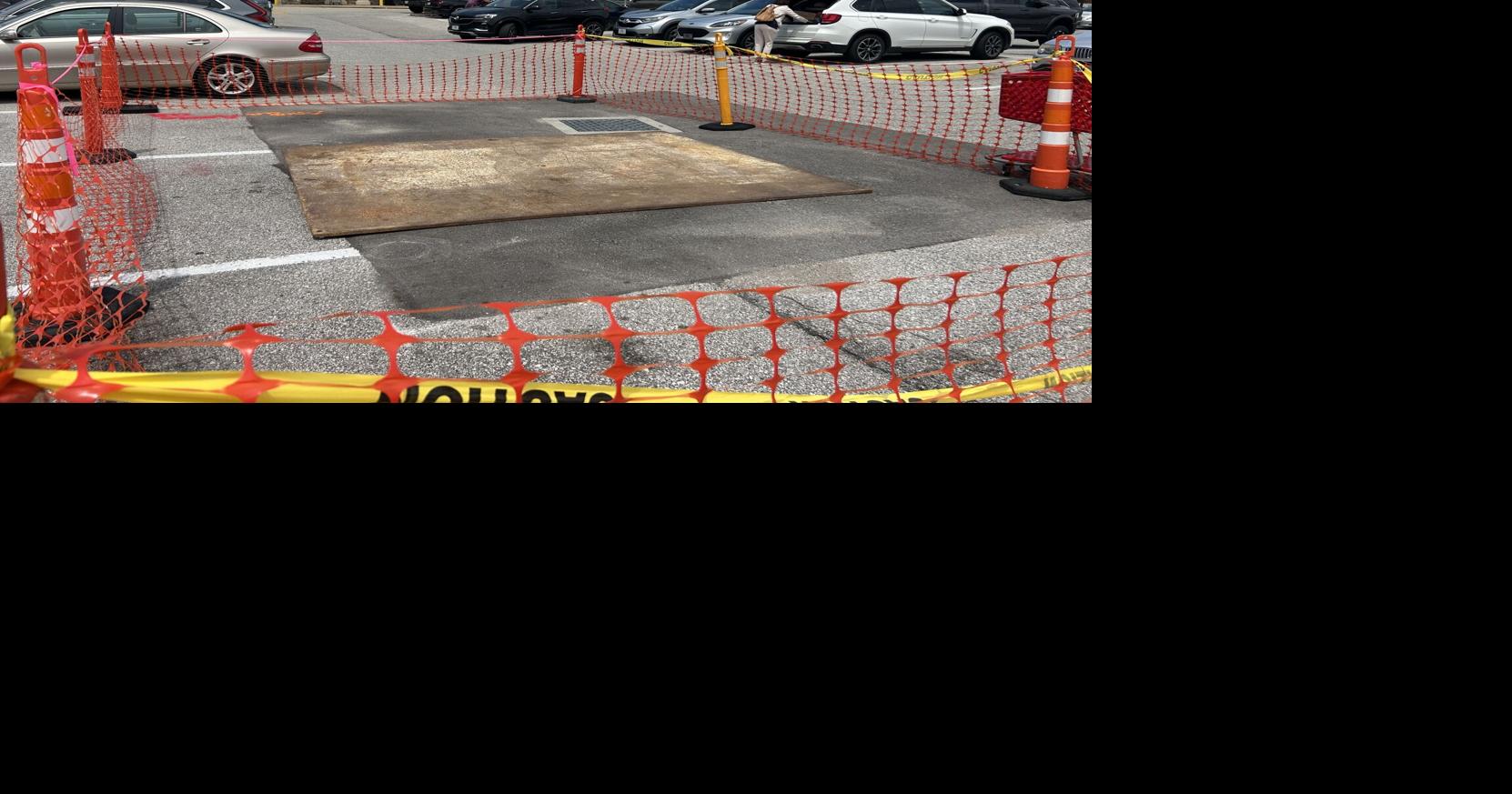 Businesses unfazed by sinkhole in Brentwood Promenade parking lot. 'Just one more thing'