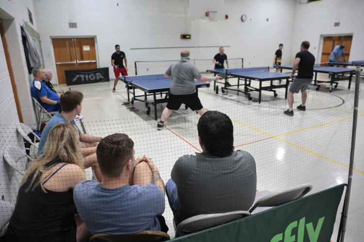 Table tennis enthusiasts meet and play hard