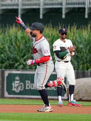Philadelphia Phillies designated hitter Kyle Schwarber (12) rounds the bases after a home run during a baseball game between the