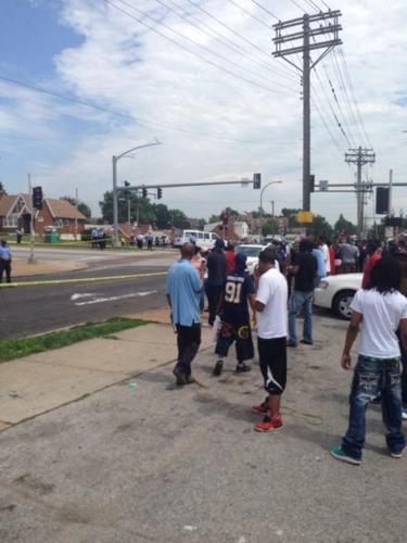 Crowd gathers at scene of officer-involved fatal shooting in St. Louis