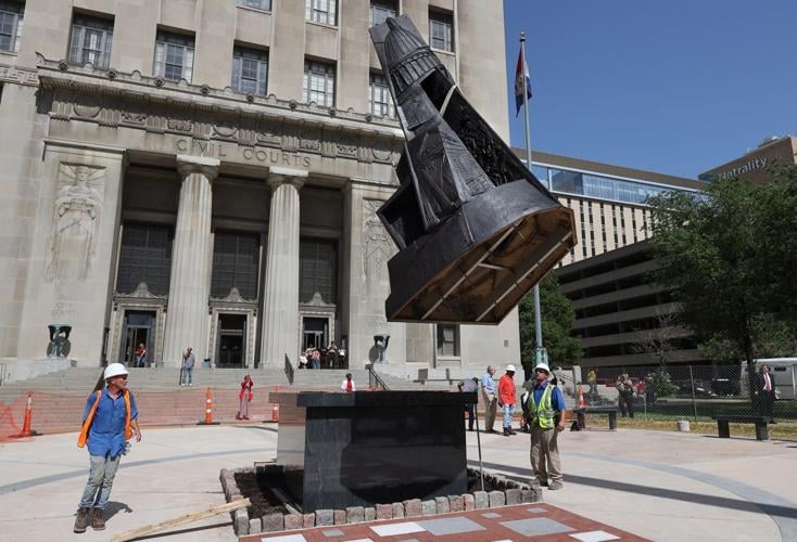 Freedom Suits Memorial sculpture installed on east side of the St. Louis Civil Courts building in St. Louis