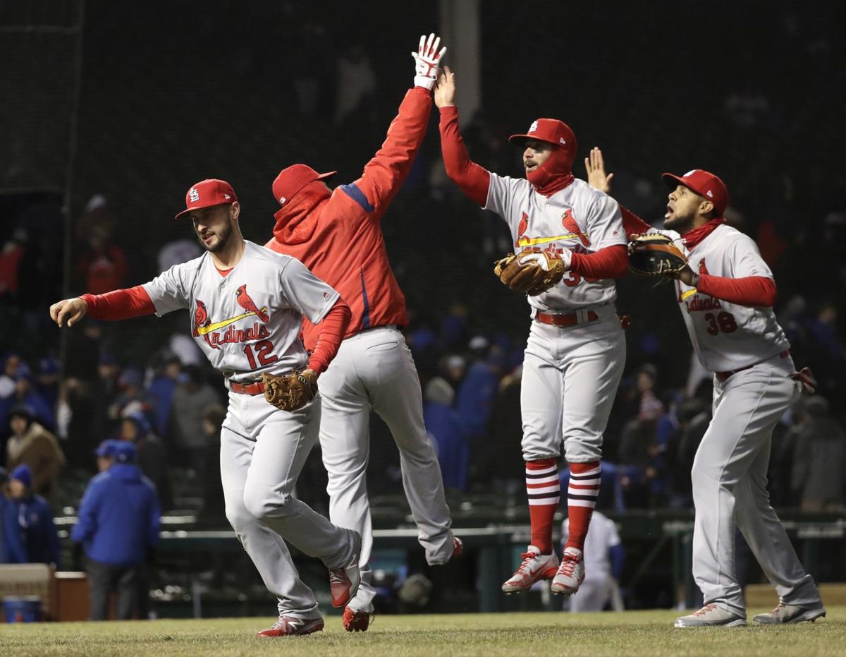 Win at wintry Wrigley gives Cardinals a warm feeling St. Louis